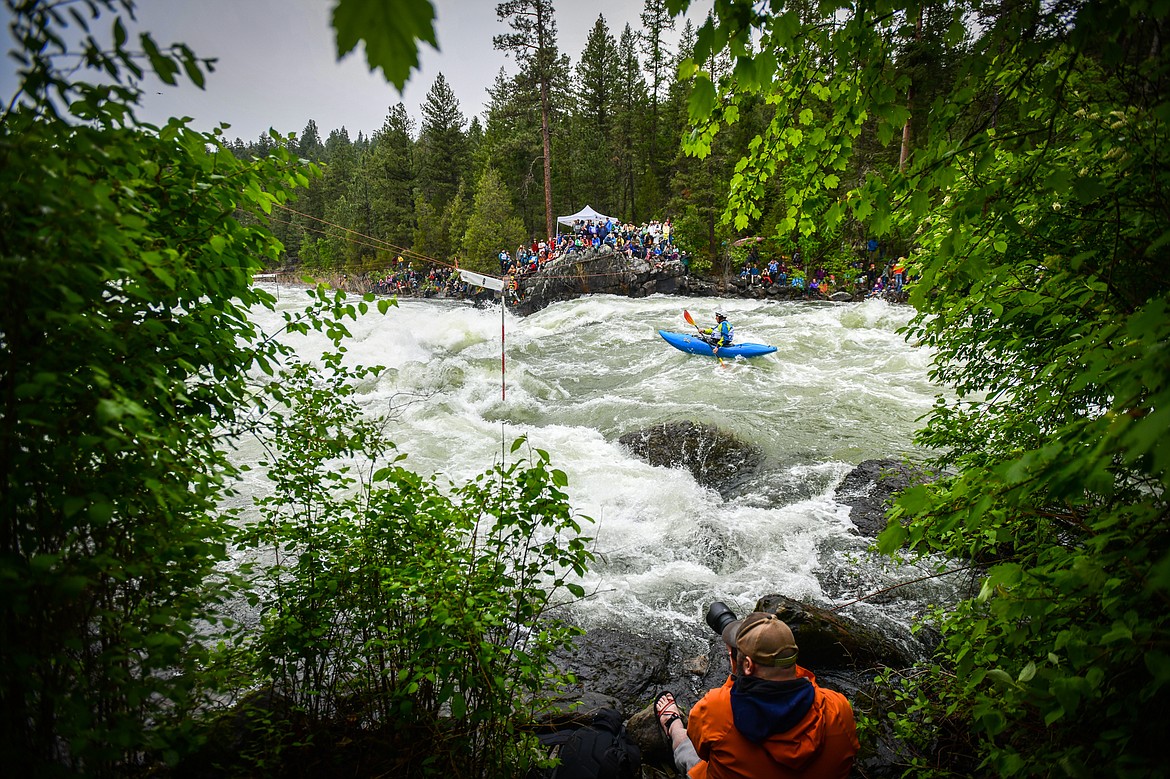 A kayaker navigates a section of the Wild Mile along the Swan River during the Expert Slalom event at the 48th annual Bigfork Whitewater Festival on Saturday, May 27. (Casey Kreider/Daily Inter Lake)