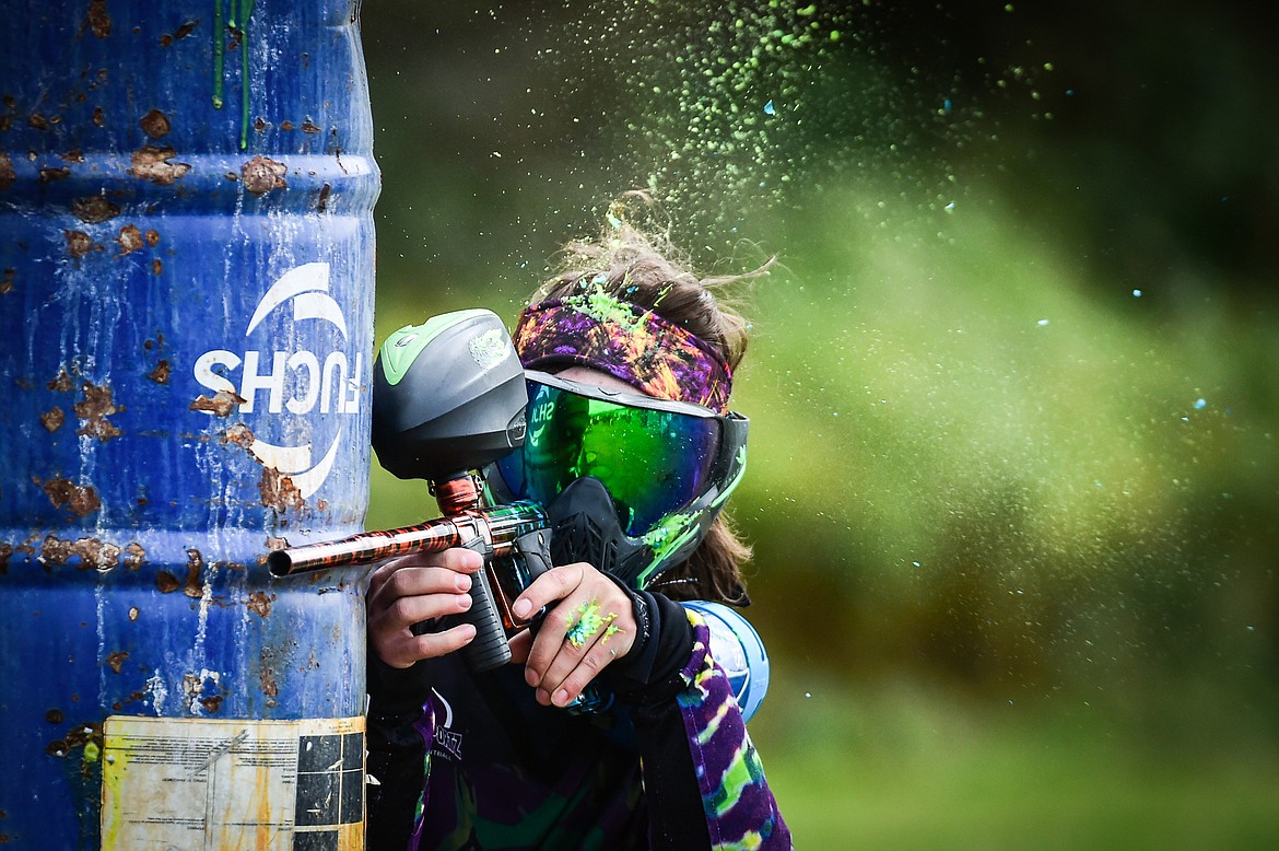 Paint splatter flies as a player gets hit during a game of five-on-five at Montana Action Paintball near Kila on Saturday, Sept. 23. (Casey Kreider/Daily Inter Lake)