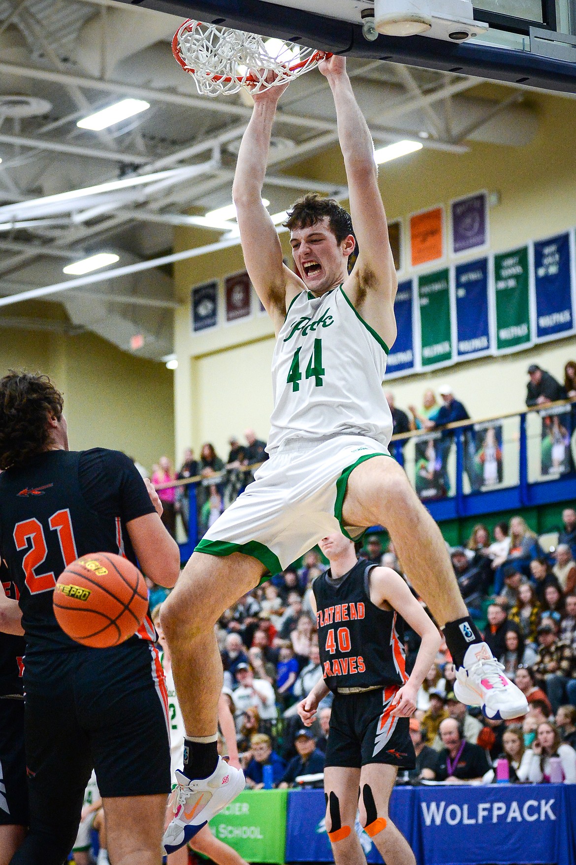 Glacier's Noah Dowler (44) throws down a dunk in the second quarter against Flathead during crosstown basketball at Glacier High School on Friday, Jan. 20. (Casey Kreider/Daily Inter Lake)