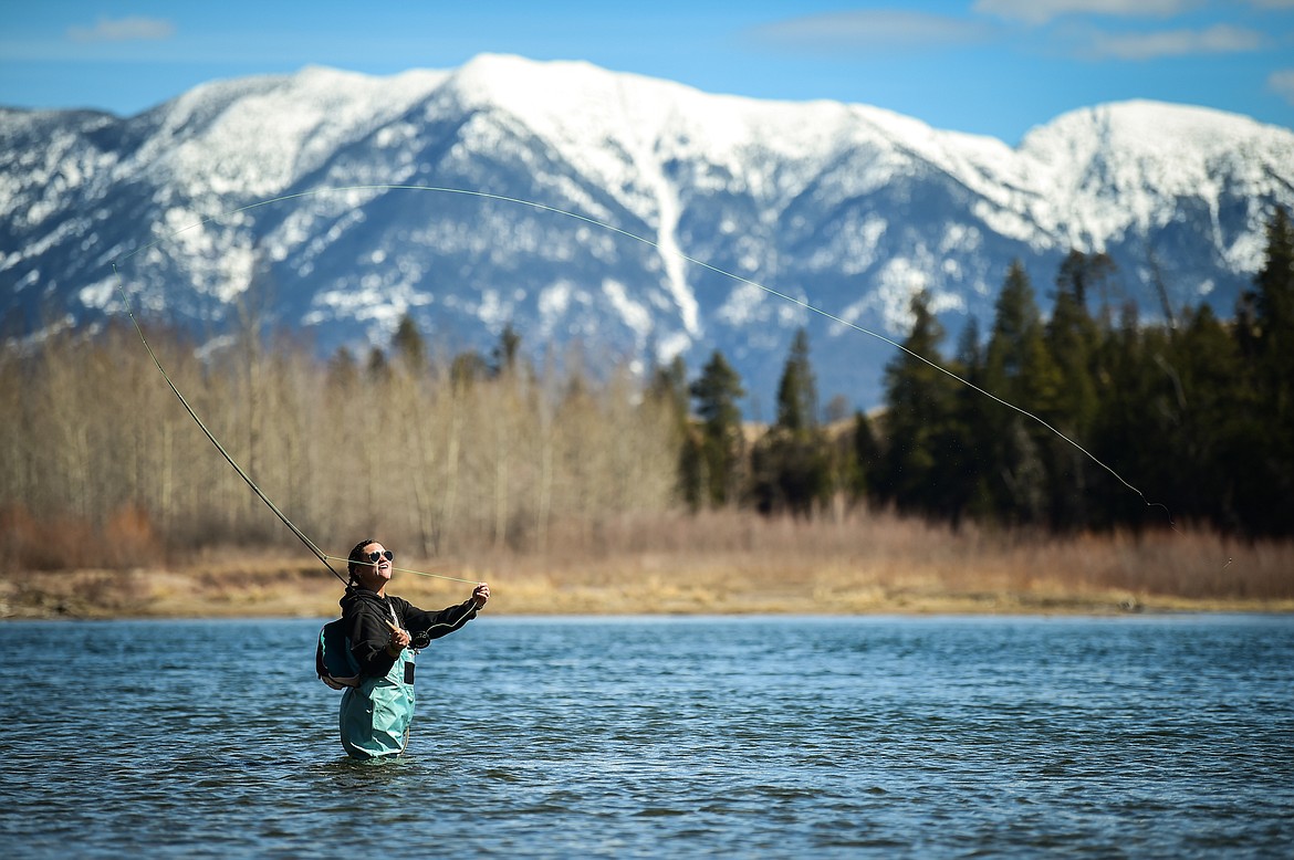 Bailey Roberts practices her casting technique in the Flathead River on Thursday, April 6. (Casey Kreider/Daily Inter Lake)
