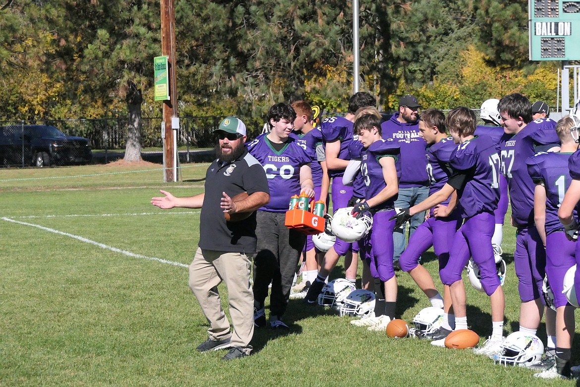 St. Regis-Mullan co-head coach Jesse Allan gets his team ready for a game earlier this past season with Shelby, Montana.  The co-op Tigers will be moving to the Montana 8-Player West Division with Mullan, effective this fall. (Chuck Bandel/VP-MI)