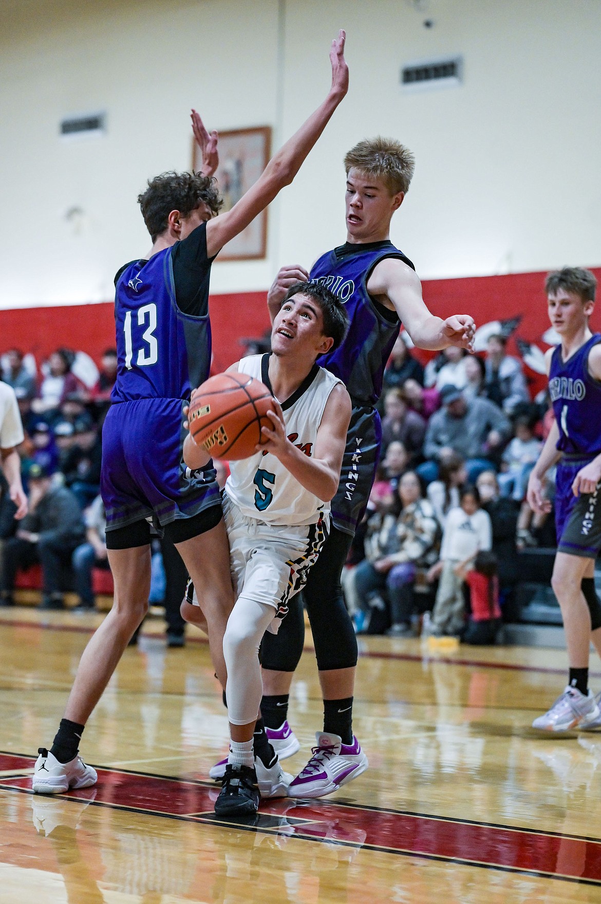 Two Eagle's Talon Addison looks for an opening during a close game against local rival Charlo Dec. 22. The Vikings prevailed 72-61. (Christa Umphrey photo)