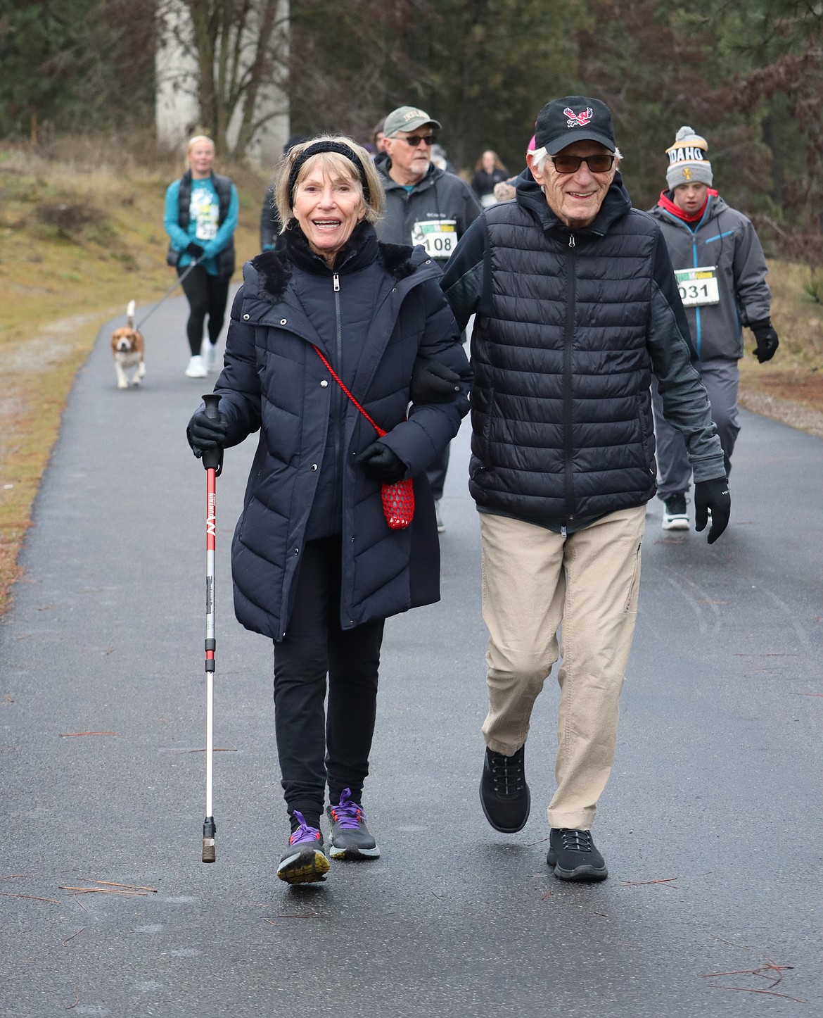 Buck and Joy Fitzpatrick of Coeur d’Alene walk on the North Idaho Centennial Trail during the 47th annual New Year's Day fun run to benefit Tesh.