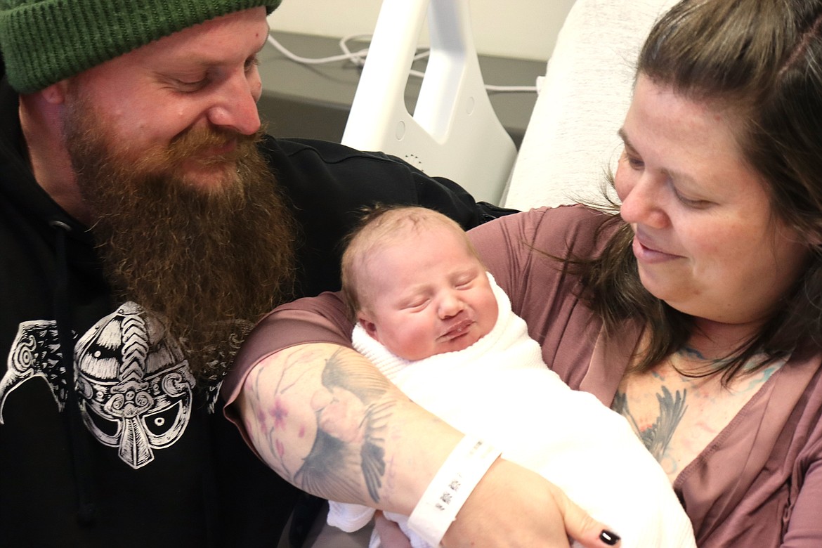 Jesse and Erin Hines of Sandpoint hold their daughter, Lorelei Elizabeth Hines, the first baby born in 2024 at Kootenai Health, at 7:23 a.m. Monday. Lorelei weighed six pounds, nine ounces and was 20 inches in length. "She's going great," Erin Hines said.