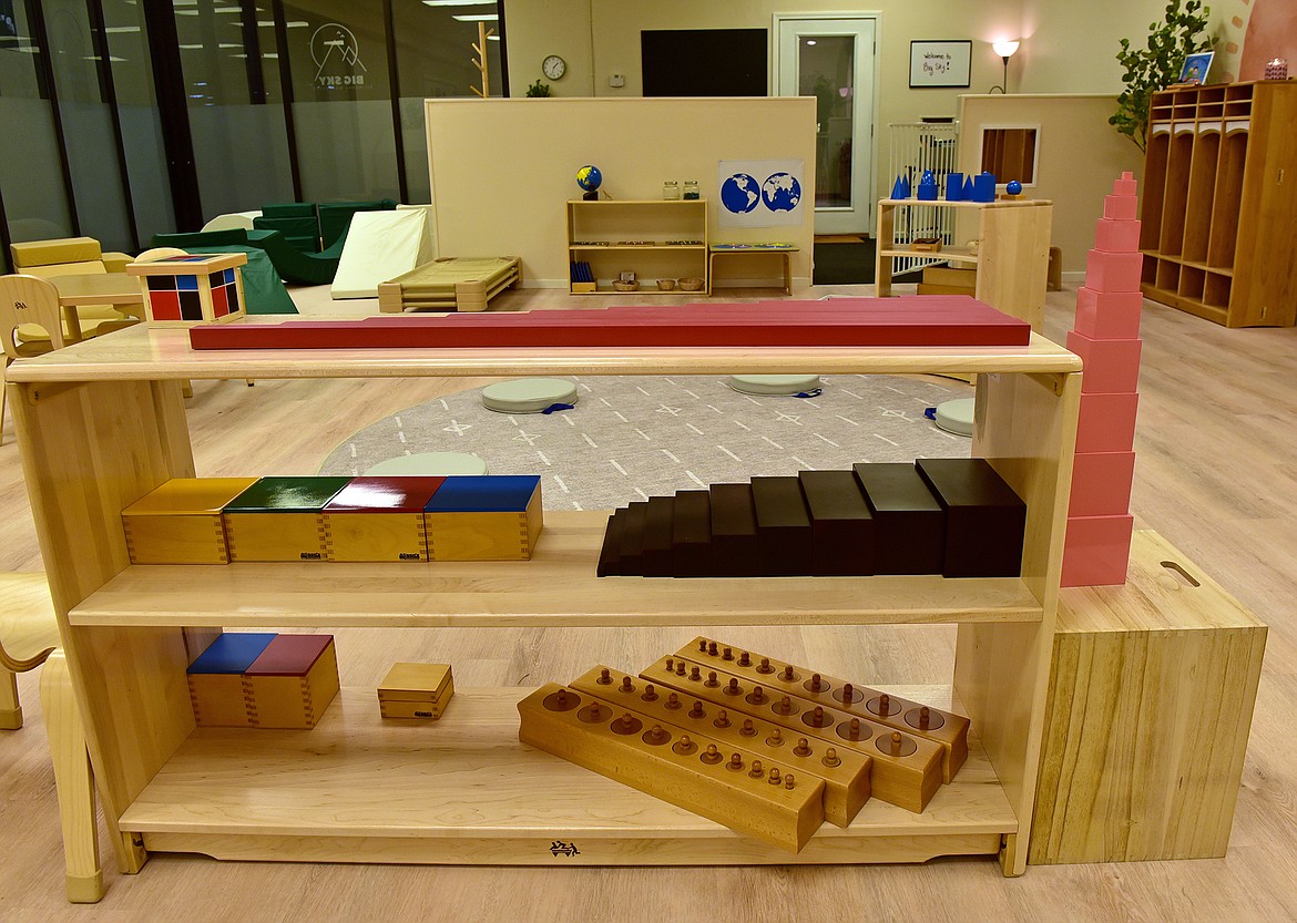 A shelf contains Montessori specific materials at the Big Sky Montessori bilingual preschool. (Whitney England/Whitefish Pilot)