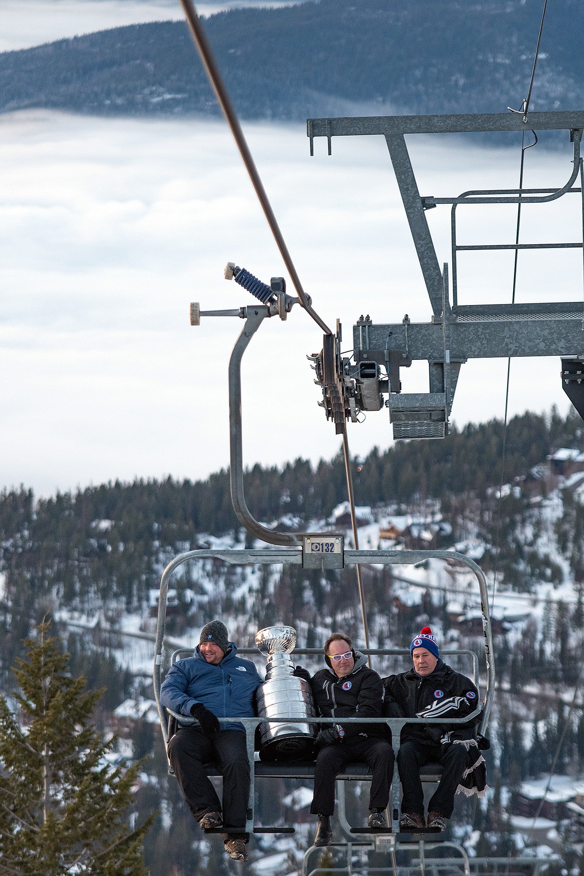 Rob Foley, chief business officer of the Vegas Golden Knights and board member of Winter Sports Inc., rides Chair 1 at the Whitefish Mountain Resort with the Stanley Cup and two Keepers of the Cup from the Hockey Hall of Fame in Toronto, Canada. (Photo courtesy Whitefish Mountain Resort)