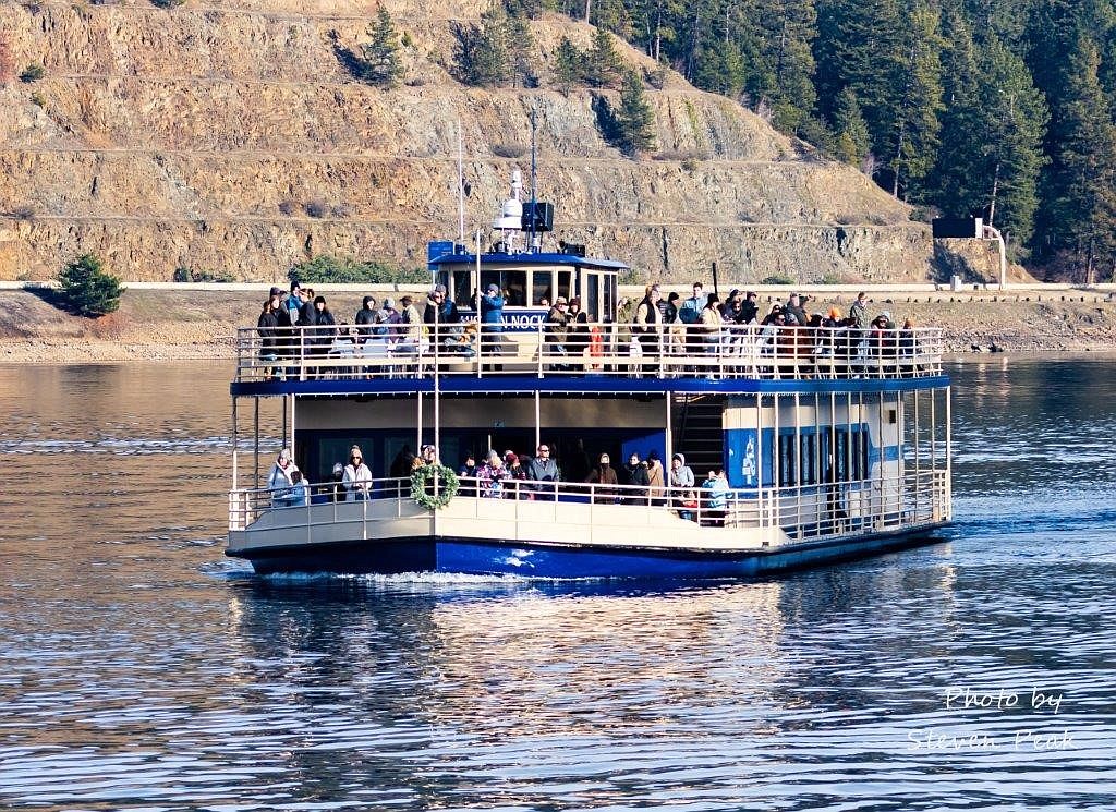 A Lake Coeur d'Alene Cruises boat takes guests on an eagle cruise on Thursday.