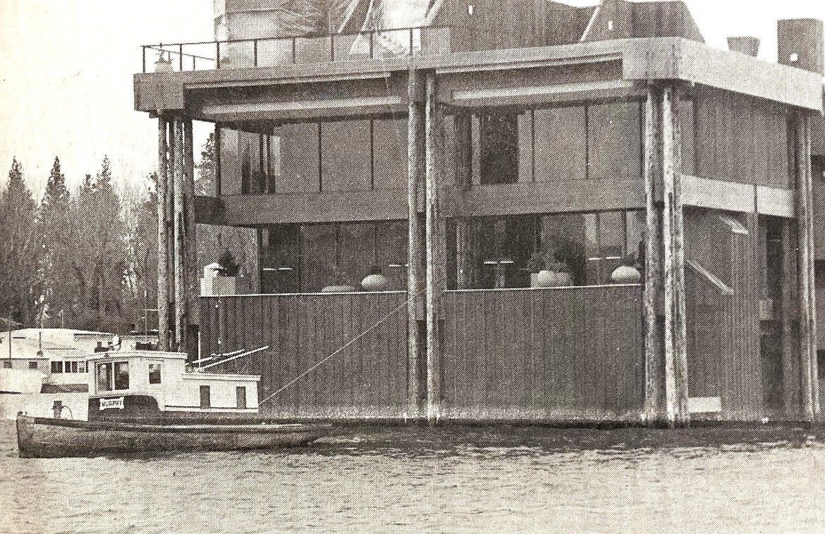 A Fred Murphy tug pretends to tow Hagadone HQ to protect it from flood waters.