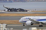 Investigators focus on air traffic communication after a fatal Tokyo runway crash