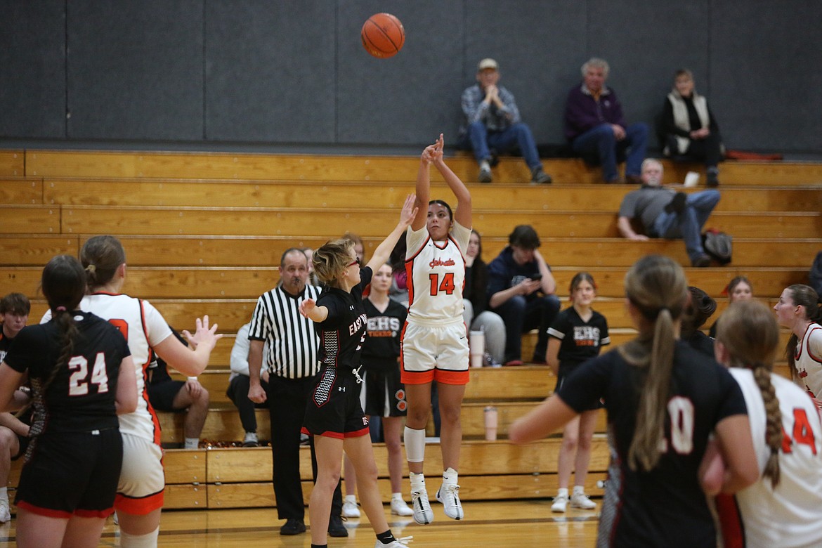 Ephrata senior Alessa Soto (14) attempts a three-pointer against East Valley (Yakima). Soto led the Tigers with 21 points.