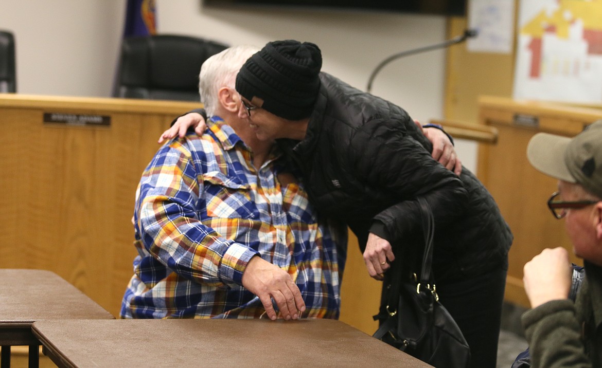 Former Rathdrum Chamber staffer Shanie Rountree gives Rathdrum Mayor Vic Holmes a hug during his retirement party Wednesday. Holmes did not seek re-election after 16 years as mayor and 20 with the city of Rathdrum. His last day is Wednesday.