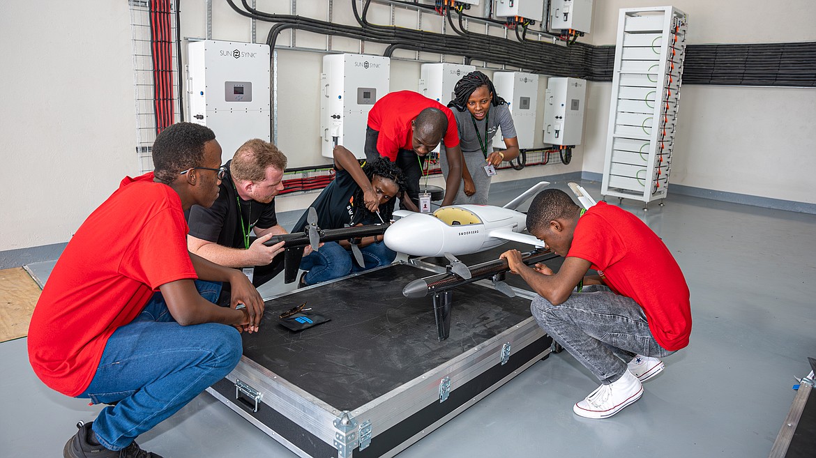 A team from The Luke Commission checks over a drone. The Luke Commission team expects to begin delivering life-saving medicines, vaccines, blood, and snakebite antivenom throughout Eswatini via the nation’s new drone network