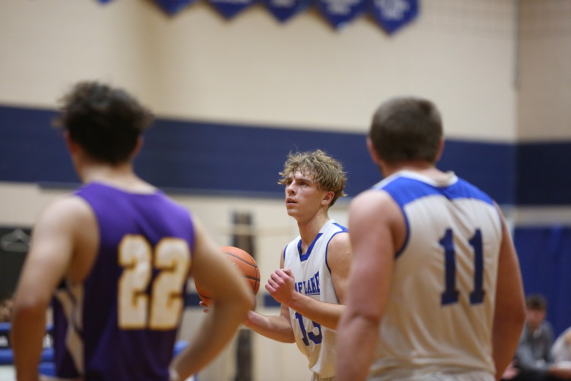 Soap Lake senior Andrey Sushik, center, attempts a free throw against Pateros on Dec. 5.