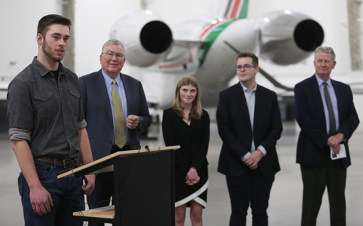 Timberlake High School senior Andrew Pettibone, left, discusses his plans to use Idaho LAUNCH grant funds for a business management degree at the University of Idaho as he speaks during a Thursday press conference at the StanCraft Jet Center in Hayden. Also pictured, from left: Lt. Gov. Scott Bedke, Timberlake senior Alycia Cameron, Timberlake college and career adviser Sebastian Kelley and Gov. Brad Little.