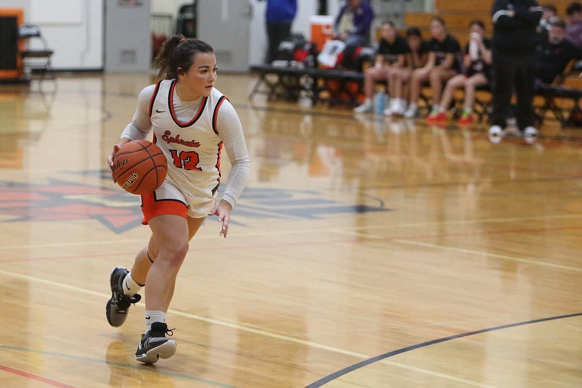 Ephrata junior Kaydence Hector looks toward the rim during the Tigers’ matchup against East Valley (Yakima) on Tuesday.