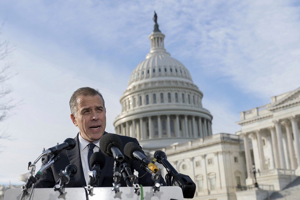 Hunter Biden, son of President Joe Biden, talks to reporters at the U.S. Capitol, in Washington, Wednesday, Dec. 13, 2023. Hunter Biden lashed out at Republican investigators who have been digging into his business dealings, insisting outside the Capitol he will only testify before a congressional committee in public. (AP Photo/Jose Luis Magana)