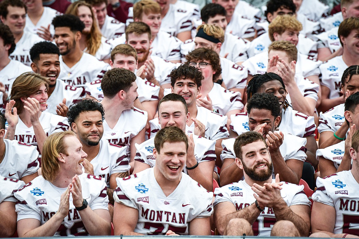 Montana Grizzlies players joke after a team picture is taken during FCS Media Day at Toyota Stadium in Frisco, Texas, on Friday, Jan. 5. (Casey Kreider/Daily Inter Lake)