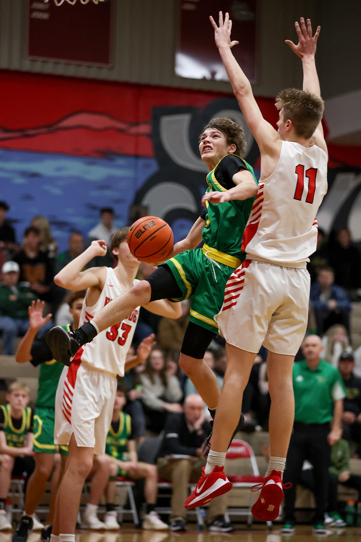 JASON DUCHOW PHOTOGRAPHY
Lakeland junior Mason Hensley splits the Sandpoint defense on his way to the basket during Friday's Inland Empire League game at Les Rogers Court.