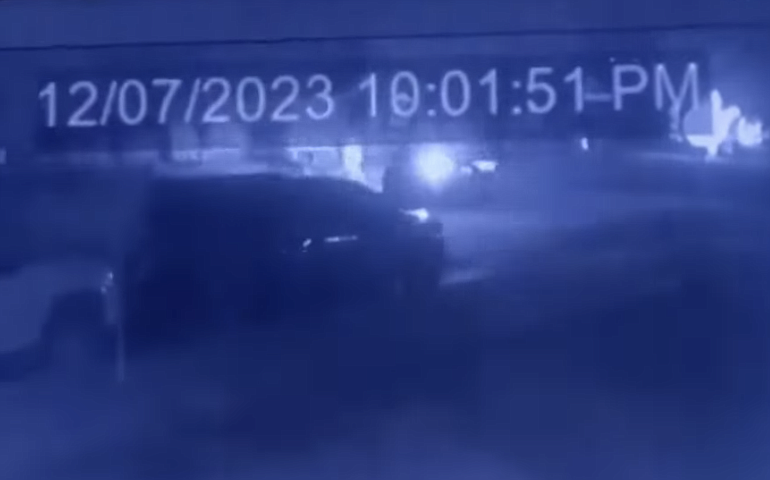 A screenshot of surveillance footage shows a hit-and-run incident in Kalispell.