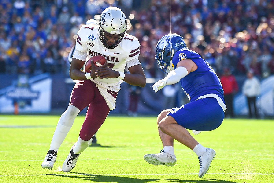 Grizzlies quarterback Clifton McDowell (17) is stopped by South Dakota State safety Tucker Large (1) on a run in the first quarter of the FCS National Championship at Toyota Stadium in Frisco, Texas on Sunday, Jan. 7. (Casey Kreider/Daily Inter Lake)