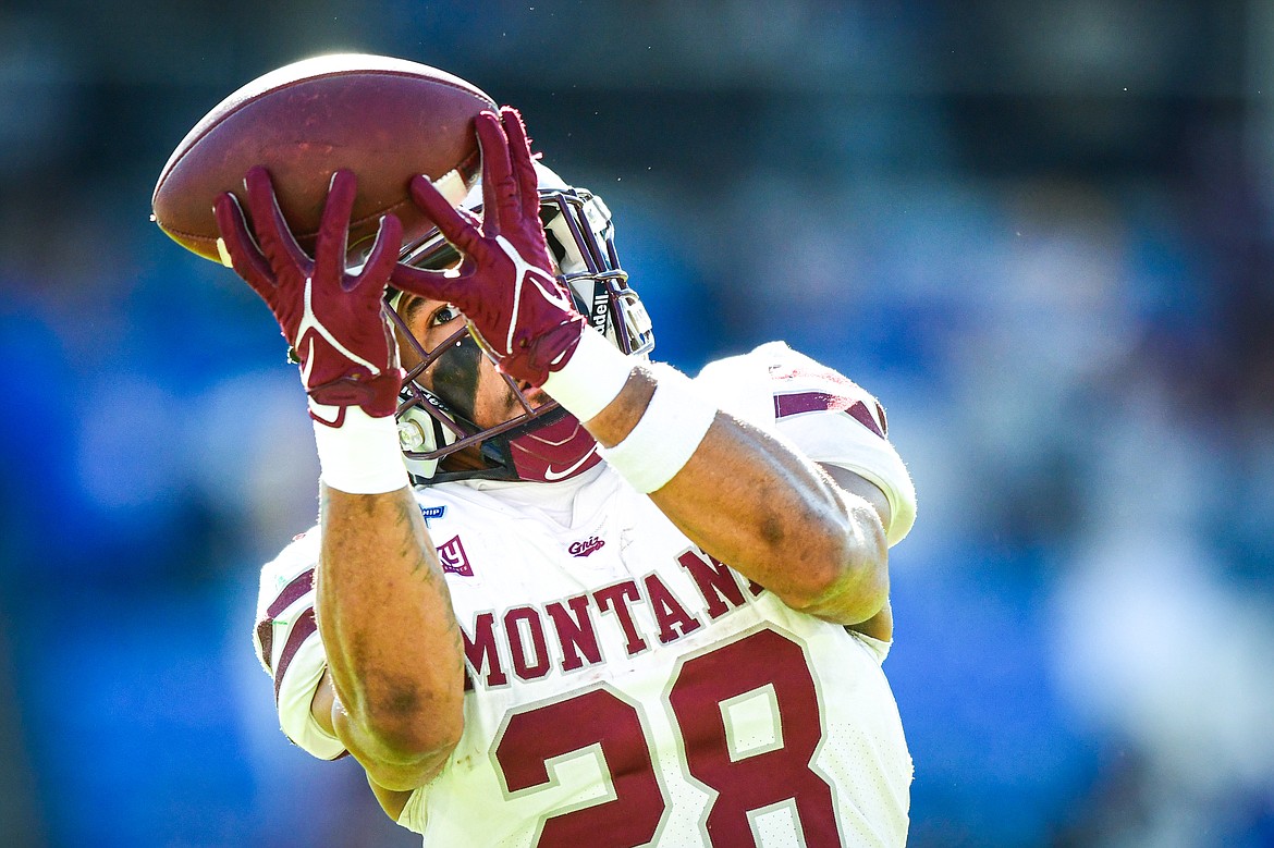 Grizzlies running back Isiah Childs (28) catches a pass during warmups before the FCS National Championship against South Dakota State at Toyota Stadium in Frisco, Texas on Sunday, Jan. 7. (Casey Kreider/Daily Inter Lake)