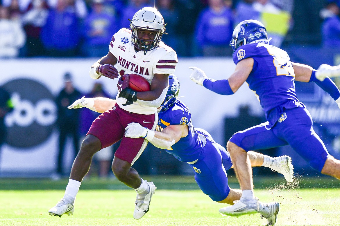 Grizzlies running back Eli Gillman (10) picks up yardage on a run in the first quarter against South Dakota State in the FCS National Championship at Toyota Stadium in Frisco, Texas on Sunday, Jan. 7. (Casey Kreider/Daily Inter Lake)