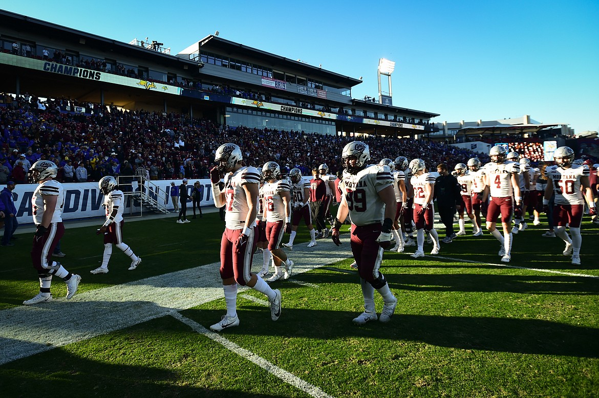 Grizzlies players walk off the field after Montana's 23-3 loss to South Dakota State in the FCS National Championship at Toyota Stadium in Frisco, Texas on Sunday, Jan. 7. (Casey Kreider/Daily Inter Lake)