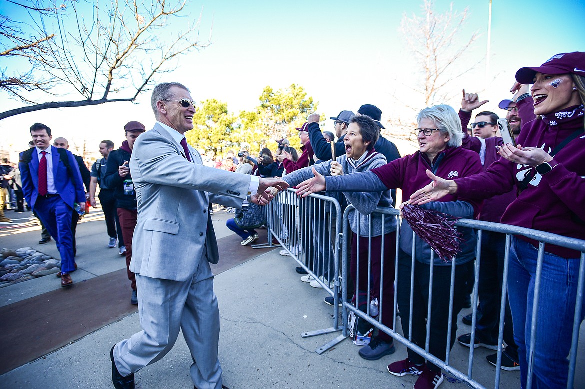 Montana head coach Bobby Hauck greets fans before the FCS National Championship against the South Dakota State Jackrabbits at Toyota Stadium in Frisco, Texas on Sunday, Jan. 7. (Casey Kreider/Daily Inter Lake)