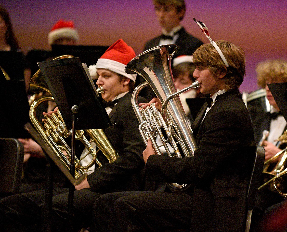 Whitefish High School band students junior Blake Rendahl (front) and freshman Arlo Mauldin play the euphonium during the combined middle and high school's winter band concert in December. (Whitney England/Whitefish Pilot)