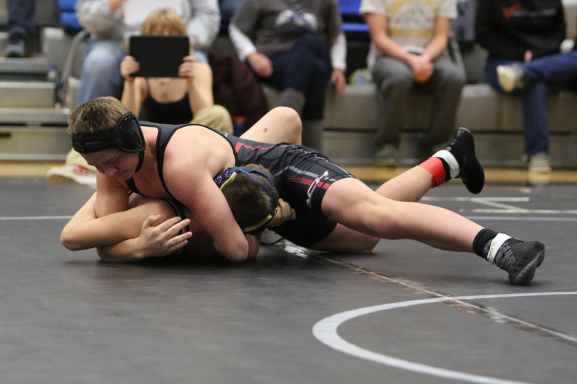 Almira/Coulee-Hartline freshman Porter Wood, top, gets a quick pin at Saturday’s Banks Lake Brawl in Coulee City.