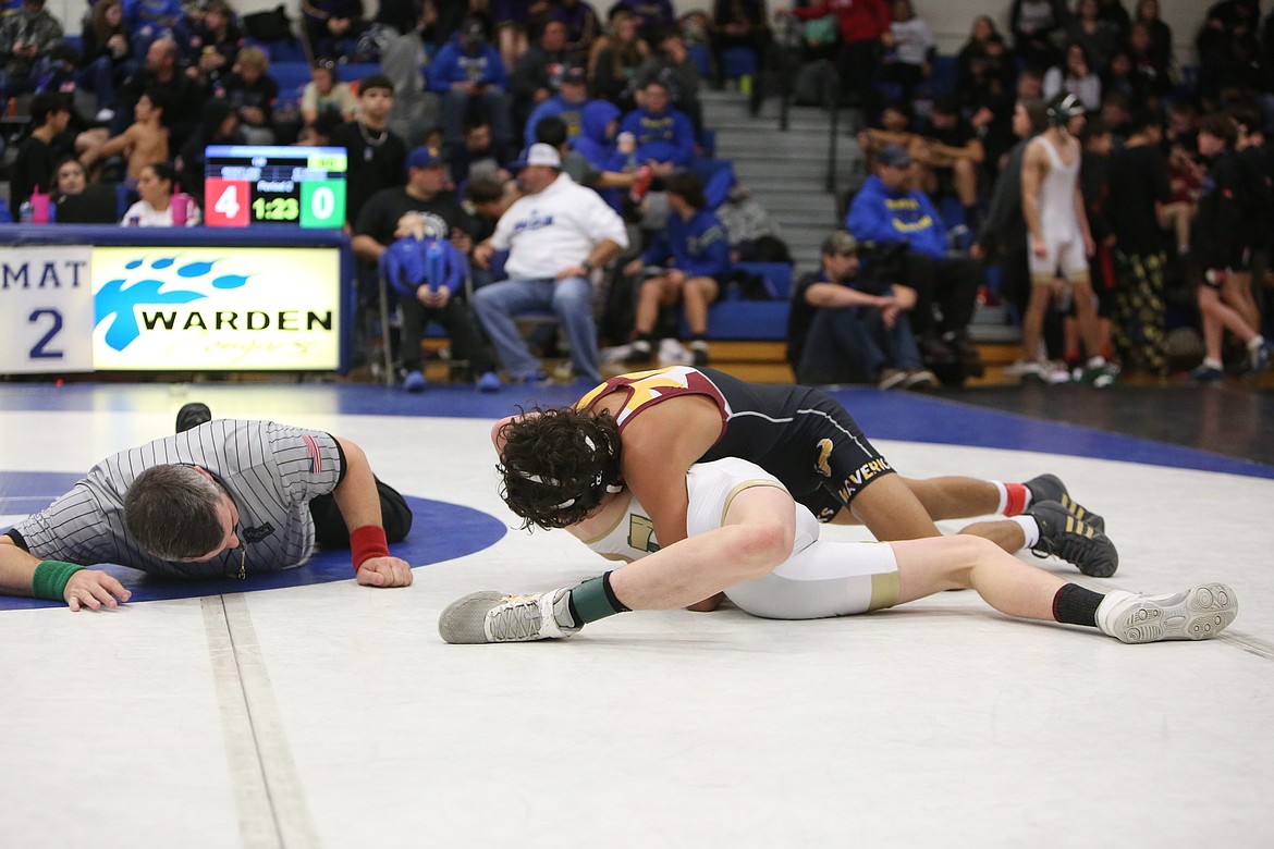 Moses Lake freshman Duane Zamora, top, placed first in the 120-pound bracket at Saturday’s Jeremiah Schmunk Invitational.