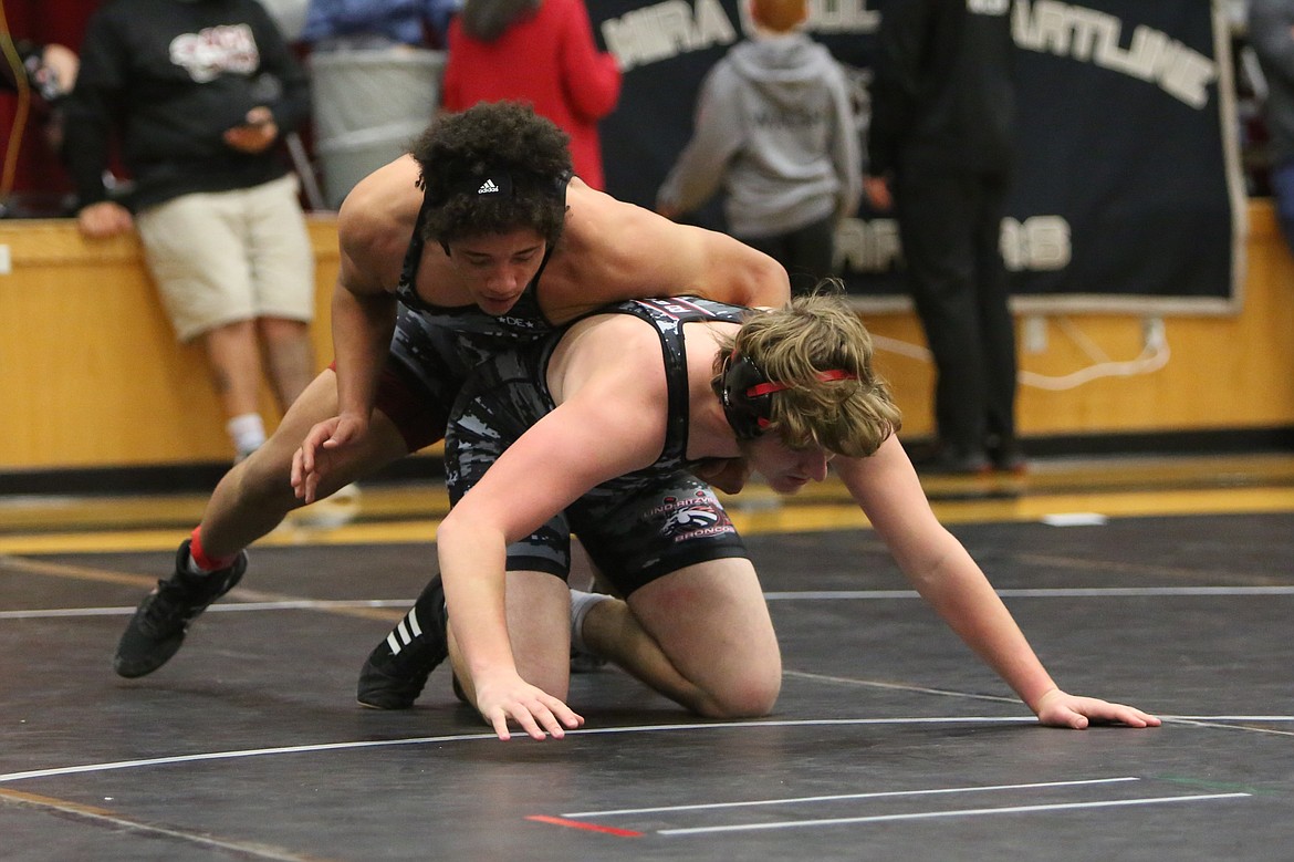 A pair of Bronco wrestlers compete against each other at Saturday’s Banks Lake Brawl in Coulee City. Lind-Ritzville/Sprague had the highest team score at the tournament, putting up 160 points.