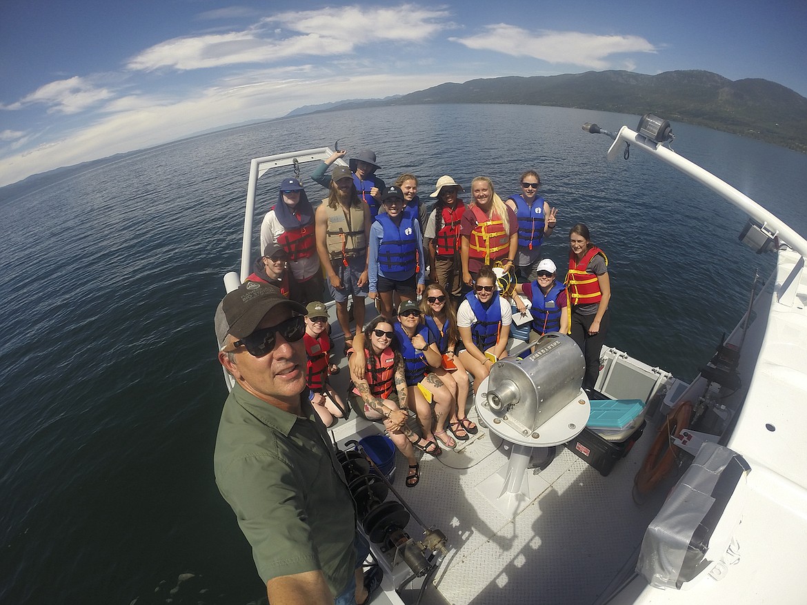 Flathead Lake Biological Station director Jim Elser with research students on Flathead Lake. (Photo courtesy of the Flathead Lake Biological Station)