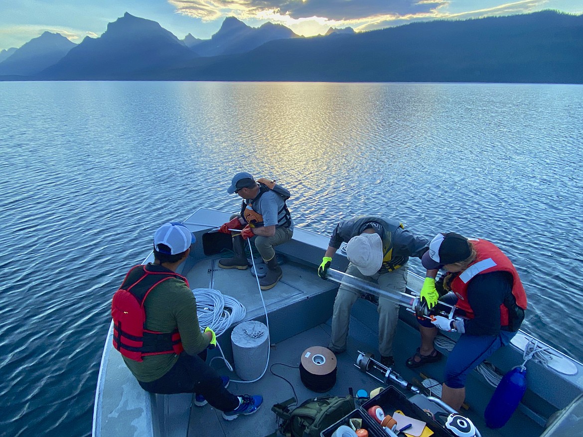 Researchers at the Flathead Lake Biological Station complete studies on a boat. (Photo courtesy of the Flathead Lake Biological Station)