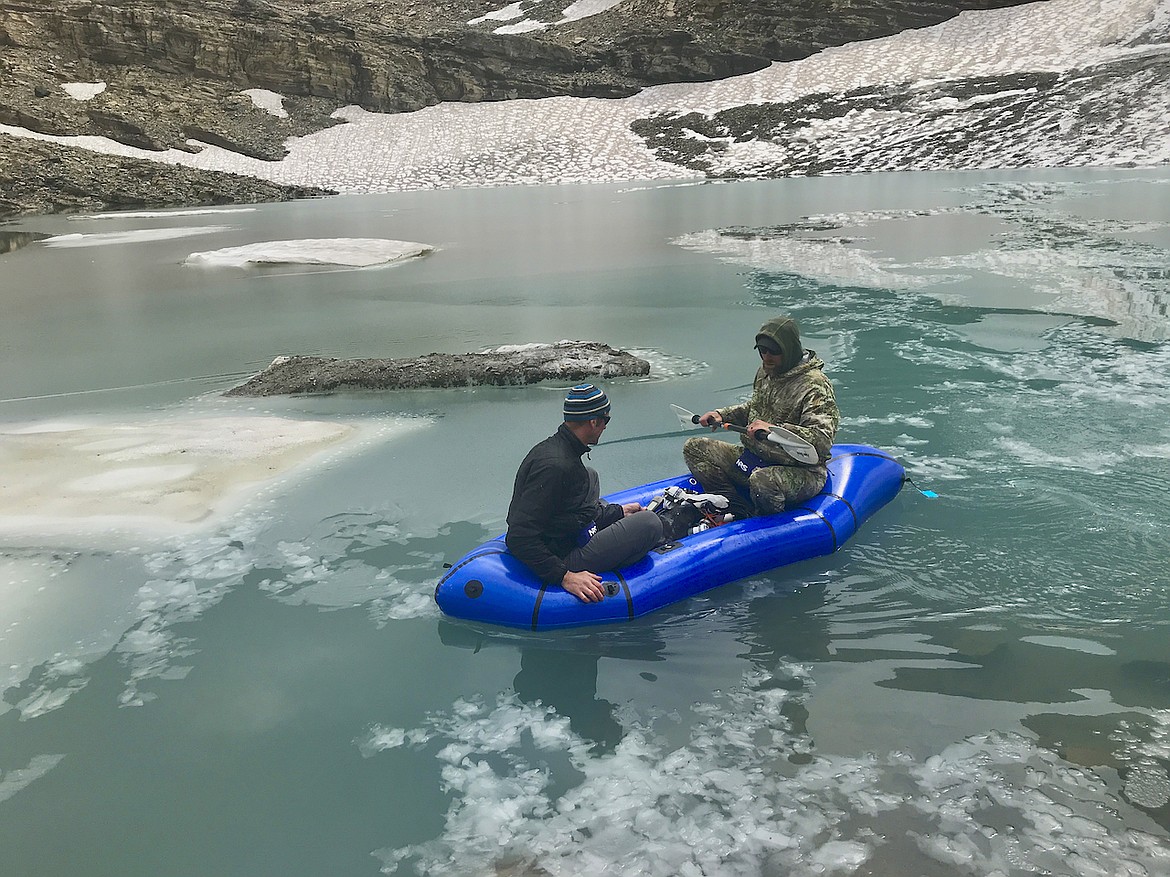 Researchers at the Flathead Biological Station do a study on a boat in Glacier National Park. (Photo courtesy of the Flathead Lake Biological Center)