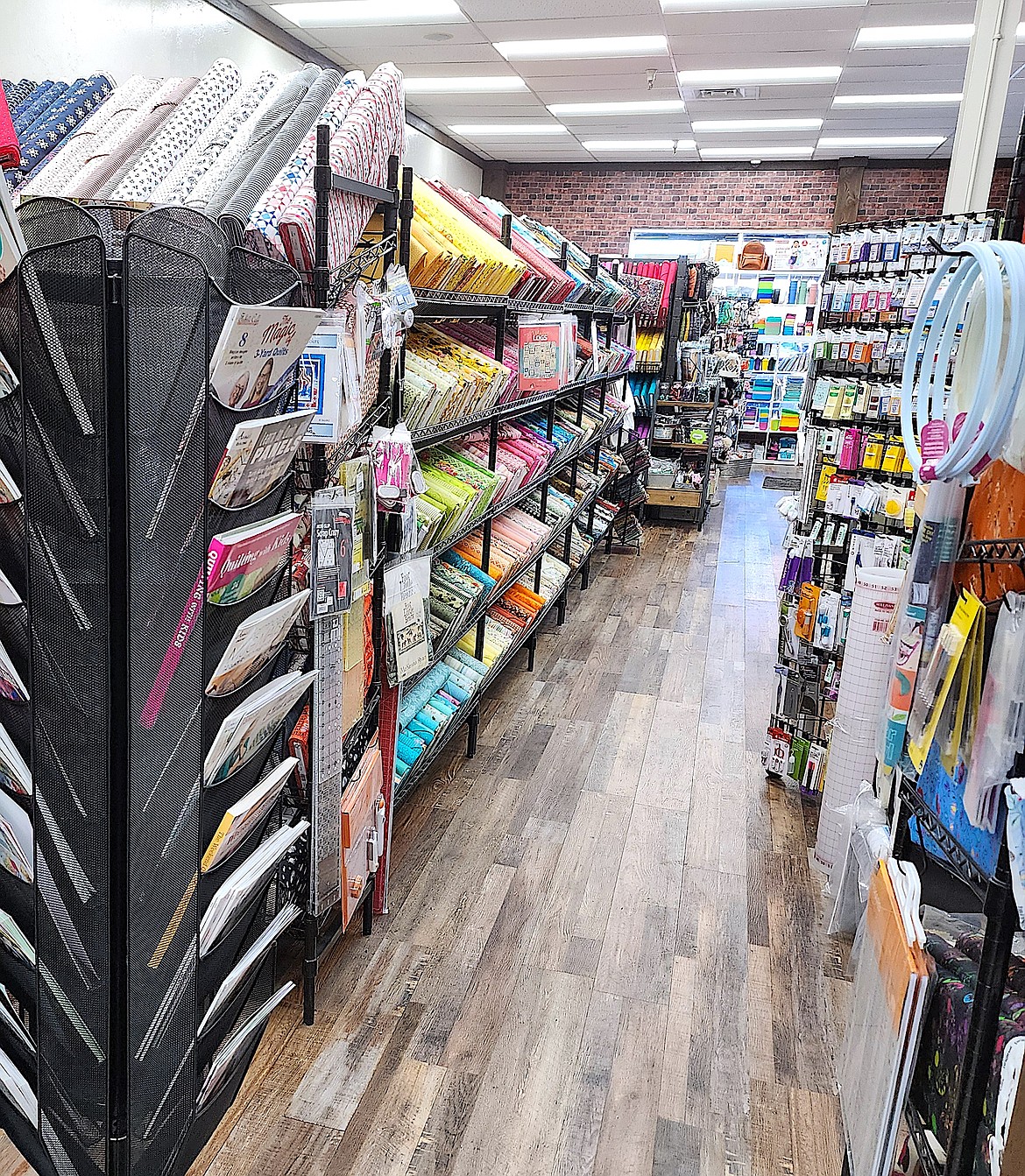 Shelves loaded with high quality quilting cottons line the aisles of Swanky Sisters Mercantile in Ronan. (Berl Tiskus/Leader)