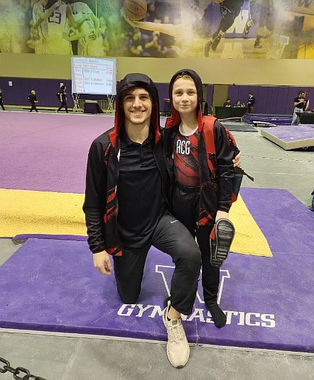 Courtesy photo
Avant Coeur Gymnastics Level 3 Kason Dellara with coach Matt Auerbach in Seattle at the Washington Open.