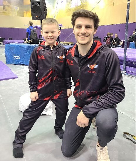 Courtesy photo
Avant Coeur Gymnastics Level 4 Derek Remelski with coach Matt Auerbach in Seattle at the Washington Open.