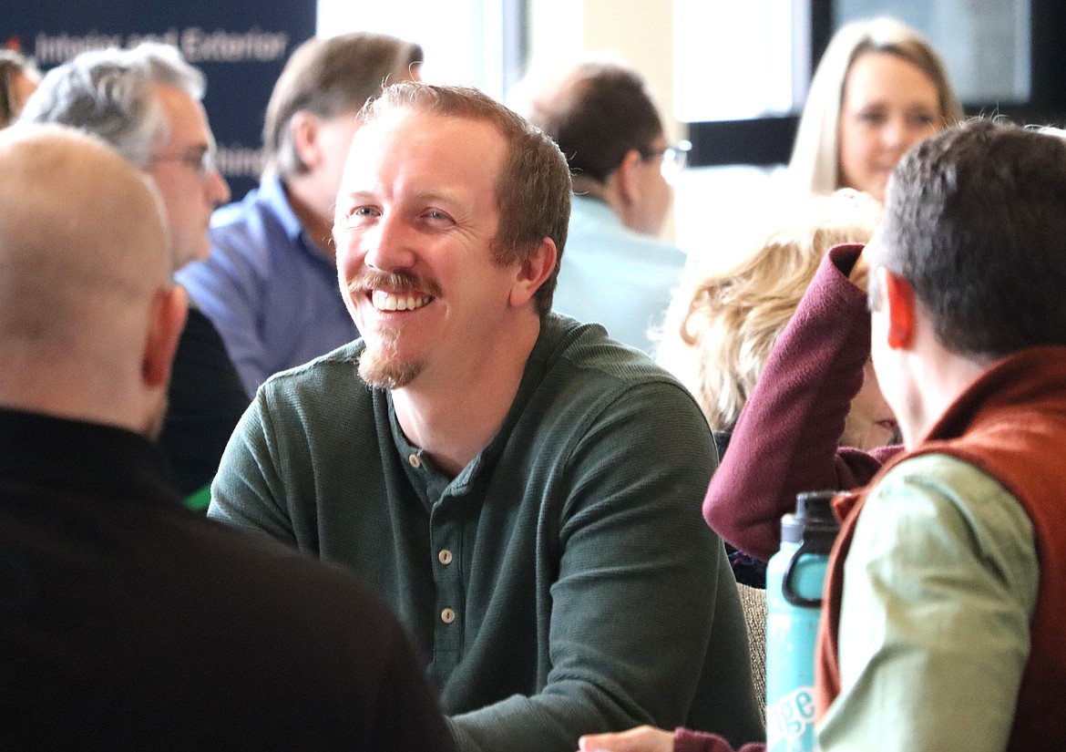 Matt Haug with Rathdrum Realty takes part in “Perk It Up CDA 24," a speed networking event at the Kroc Center on Tuesday.