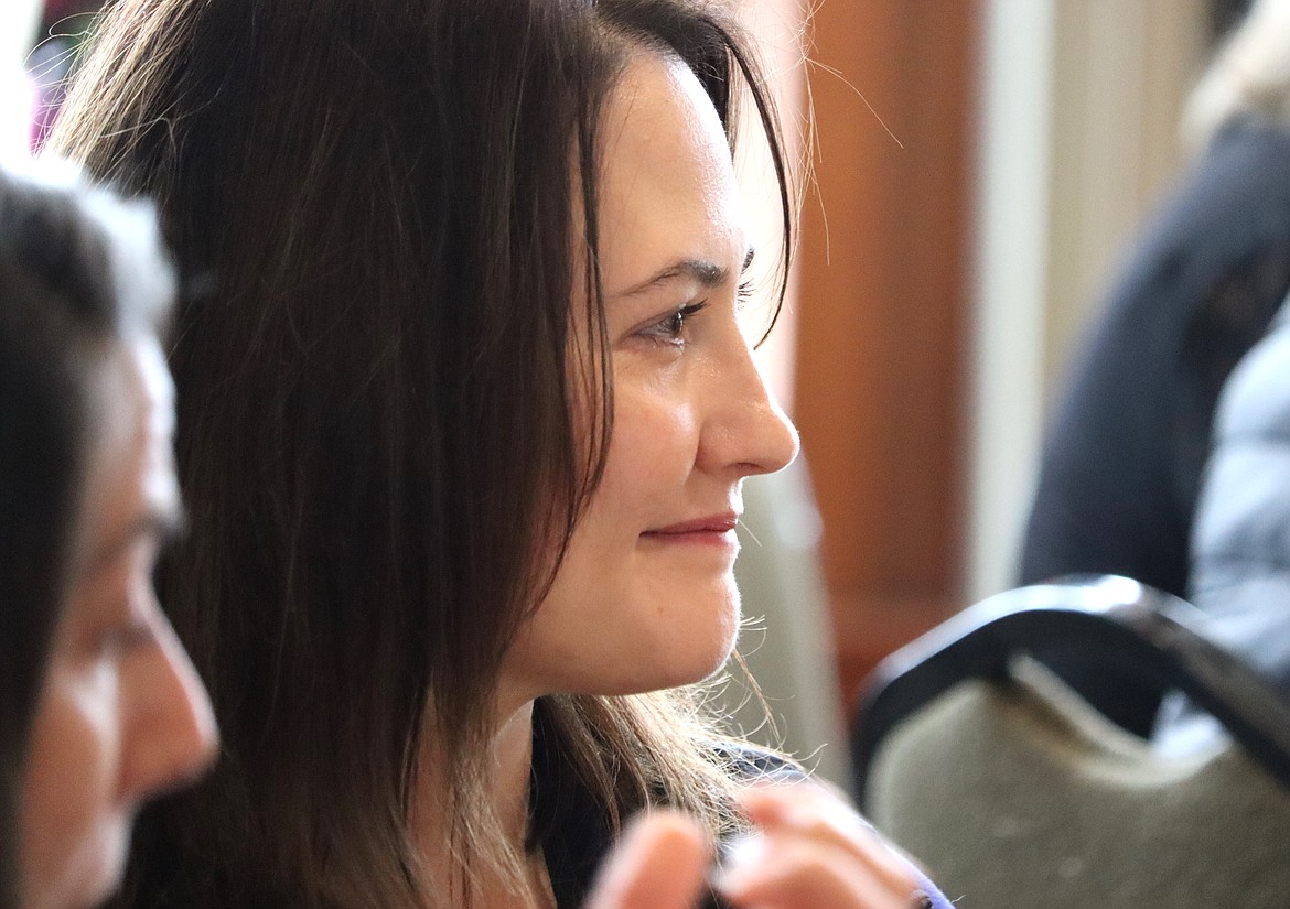 Bridget Gernns with the Kootenai County Sheriff's Office listens to a speaker during the  “Perk It Up CDA 24" speed networking event at the Kroc Center on Tuesday.