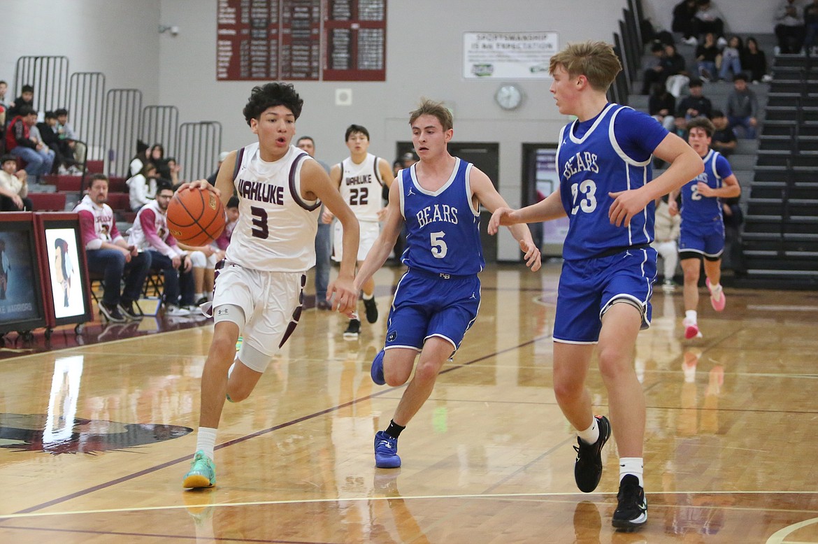 Wahluke freshman Manuel Ruvalcaba-Jimenez (3) dribbled the ball up the floor in transition against Kiona-Benton.