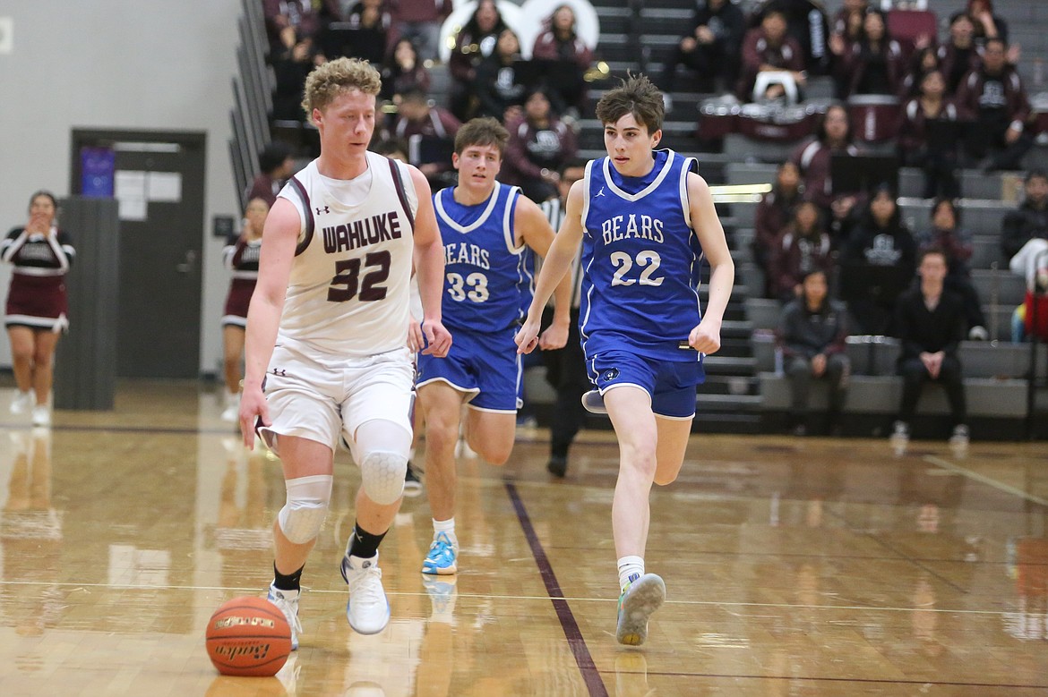 Wahluke senior Andrew Yorgesen, in white, led the Warriors in scoring with 13 points Tuesday night.