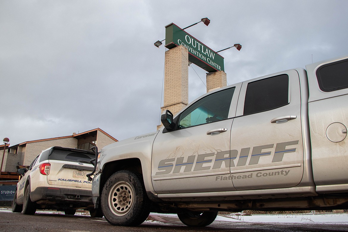 The Kalispell Police Department and Flathead County Sheriff's Department respond to a report of a suspected dead person inside of a building at the area of 18th St. E. and 3rd Ave. E. The investigation is ongoing. (Kate Heston/DailyInterLake)