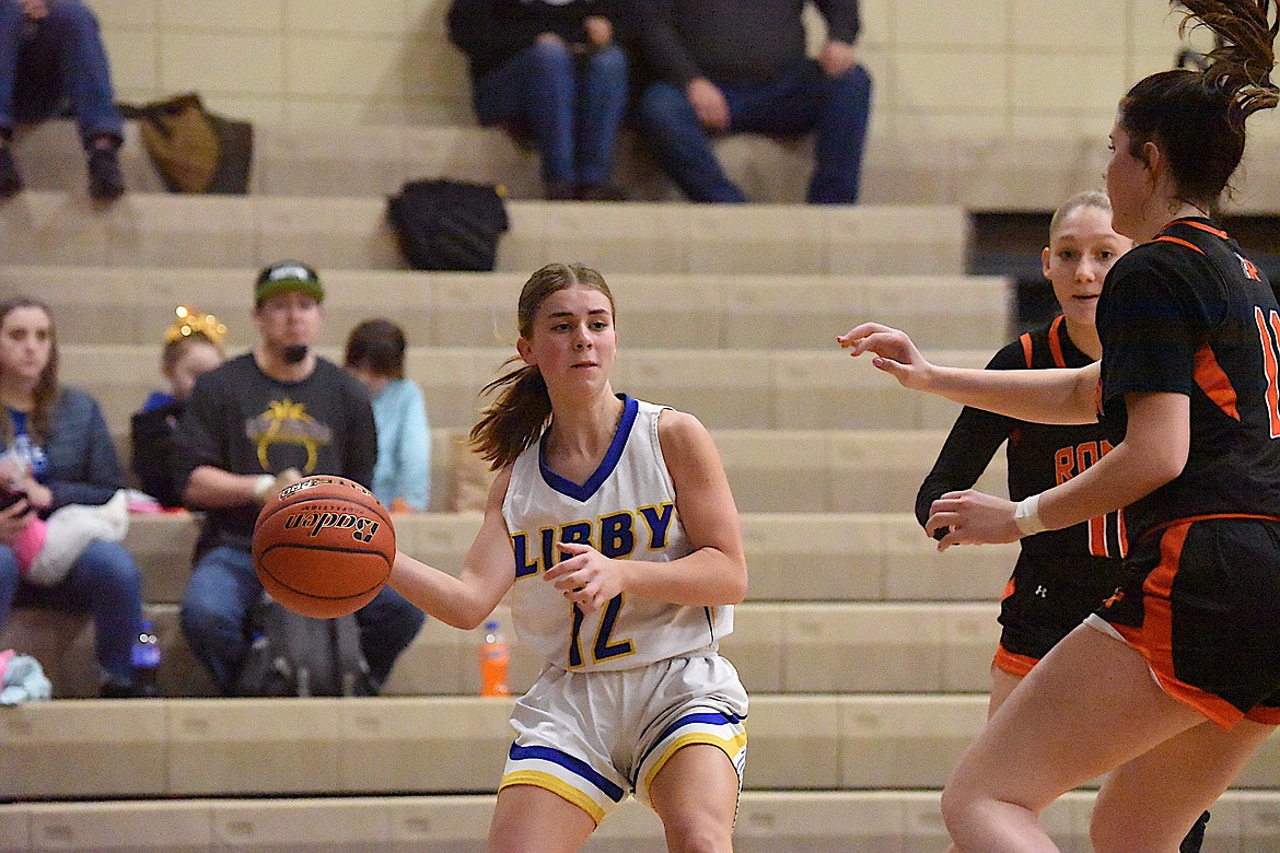 Libby's Kaydence Stanek looks to pass against Ronan on Jan. 6, 2024. (Scott Shindledecker/The Western News)