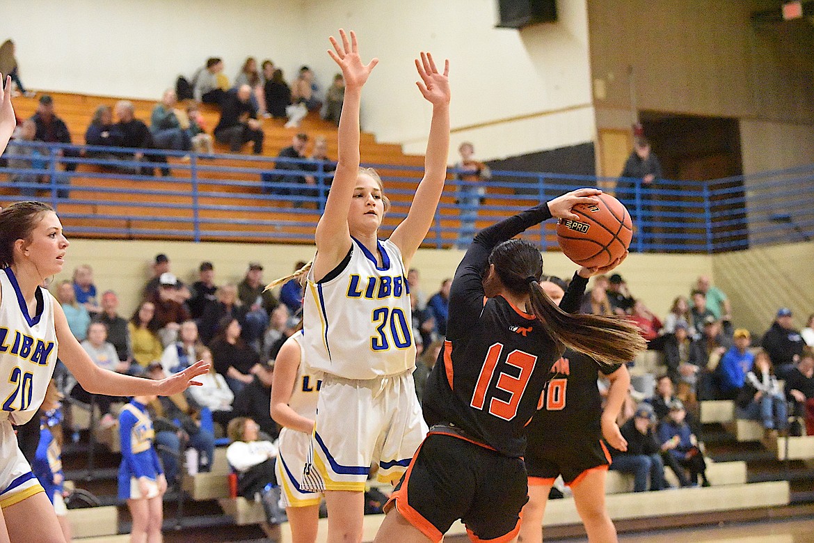 Libby's Rylee Delmas defends against Ronan's Arianna Zepeda on Jan. 6, 2024. (Scott Shindledecker/The Western News)