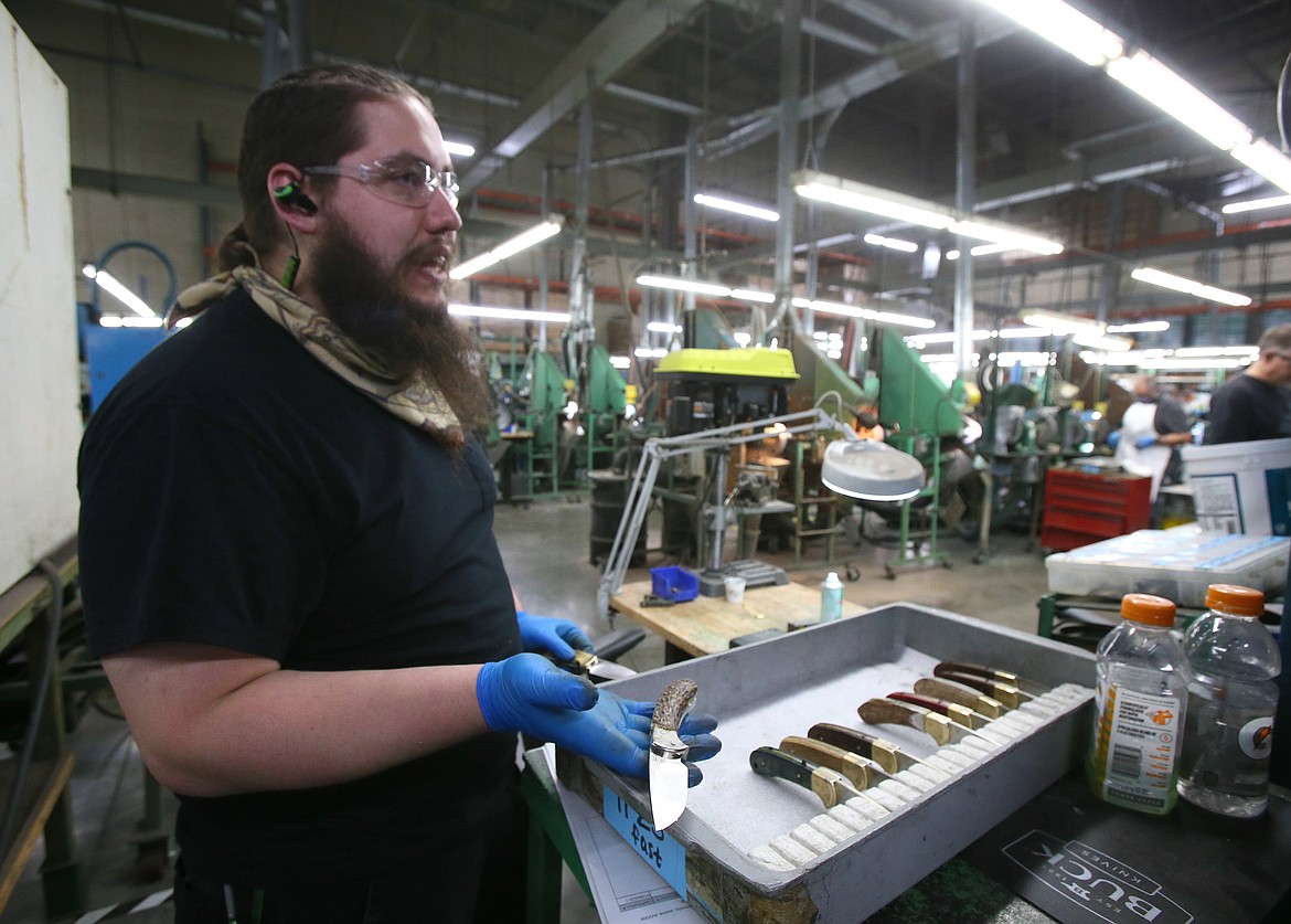 Craftsman Andrew Avoux discusses different materials used for knife handles at Buck Knives.