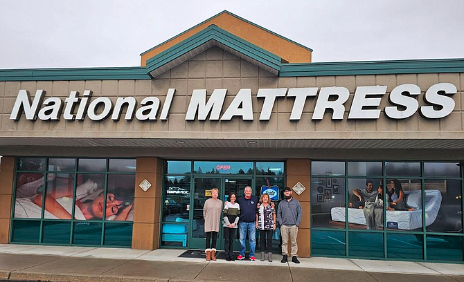 The National Mattress and Furniture team is seen outside the store at 6235 N. Sunshine St. No. 3 in Coeur d'Alene. The store is celebrating 25 years in business. From left: Dagmar Royer, Brittney Goullette, Michael Oneill, Karla Oneill and Taylor Allsbrook.