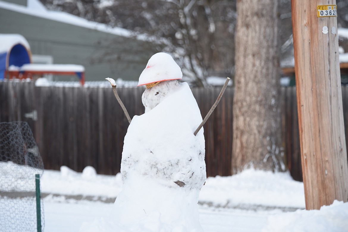 Enough snow fell in Libby last week for this snowman to be built. (Scott Shindledecker/The Western News)