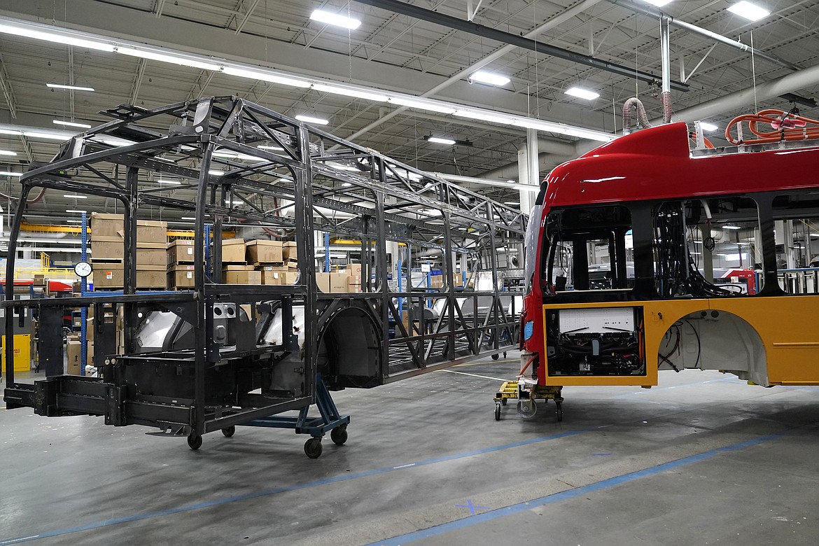 File - Parts of electric busses are viewed at New Flyer, an electric vehicles manufacturing company, Feb. 9, 2023, in St. Cloud, Minn. On Friday, the Labor Department releases producer prices data for December. (AP Photo/Abbie Parr)