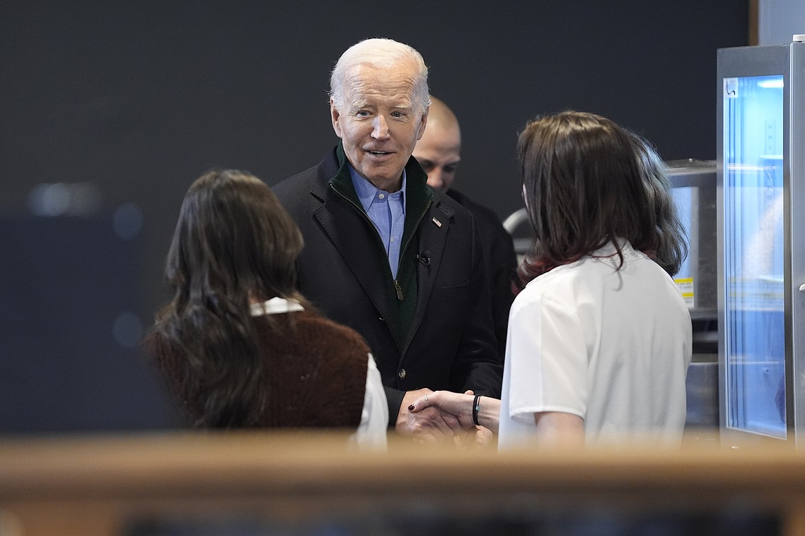 President Joe Biden speaks with employees at the Nowhere Coffee shop, during a visit to discuss his economic agenda, Friday, Jan. 12, 2024, in Emmaus, Pa. (AP Photo/Evan Vucci)